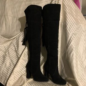 Thigh high black boots